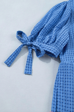 Load image into Gallery viewer, Pre-Order Blue Gingham Textured Bow Tie Short Sleeve Tiered Midi Dress