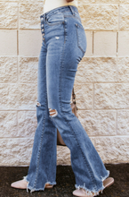 Load image into Gallery viewer, Light Blue High Waist Raw Hem Buttons Ripped Flare Jeans