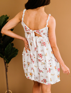 Pre-Order White Sleeveless Ruffle Backless Knot Floral Dress